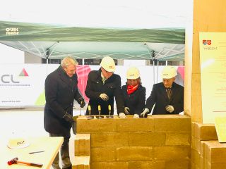 Laying the foundation stone together